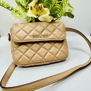 Michael Kors Sloan Belt bag in the color Bisque, light tan color